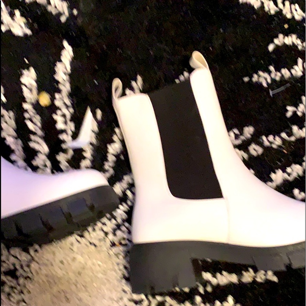 Women’s white leather boots with black side panels